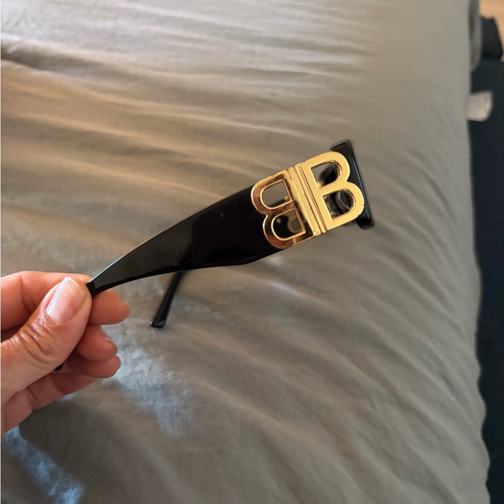 Black and Gold Balenciaga sunglasses